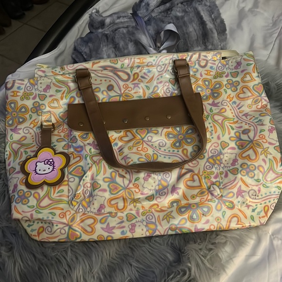 Sanrio Handbags - Sanrio Hello kitty Baby Diaper Bag with new never used Diaper Changing Pad